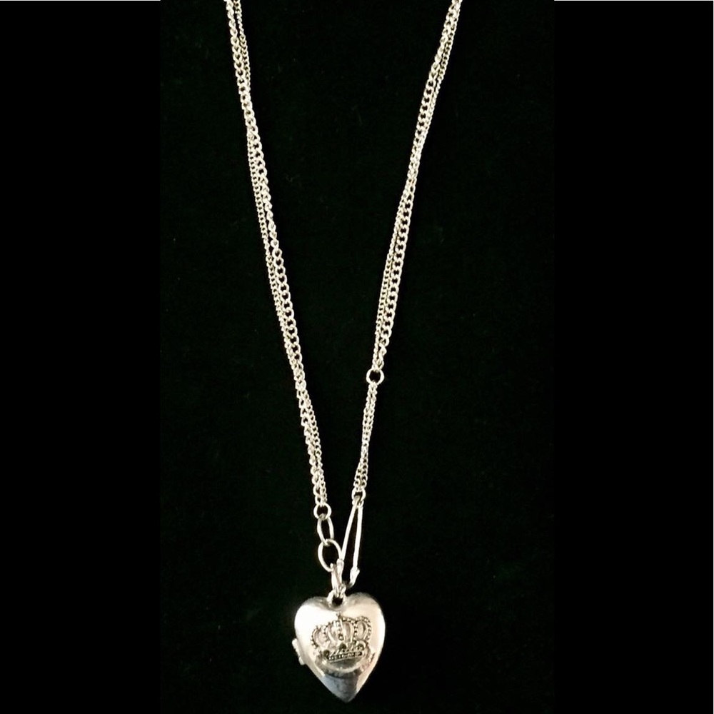 Silver chain necklace with a heart locket
